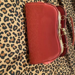 Bright burgundy handle purse ! New and in great condition!